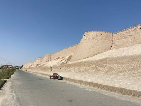 Long ancient city wall with impressive fortifications.