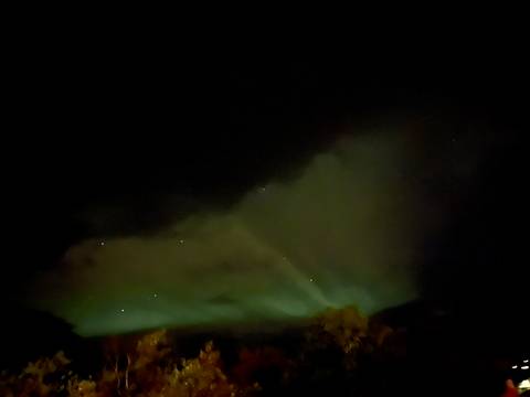 Northern lights illuminating the night sky.