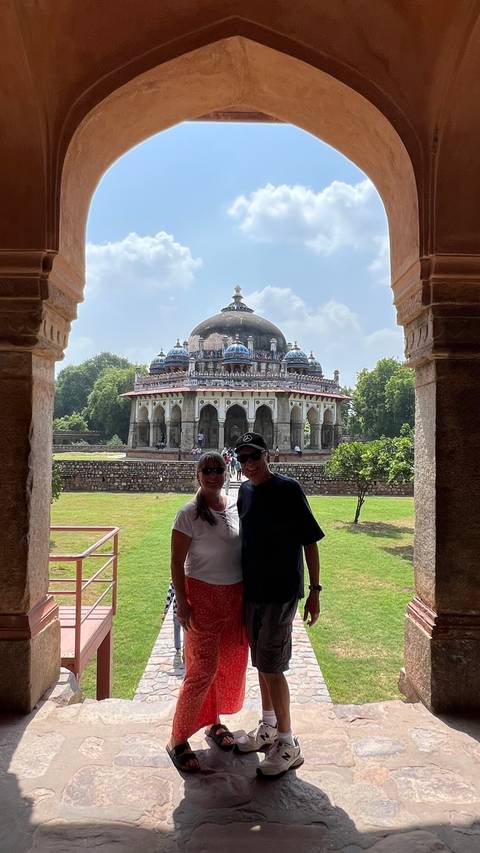 Couple posing in front of Humayun's Tomb
