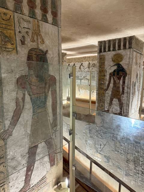 Ancient Egyptian wall paintings inside a well-preserved site.