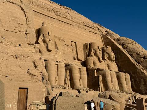 The monumental statues of Abu Simbel carved into a cliff.