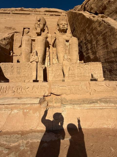 Close-up of hieroglyphics and statues at Abu Simbel.