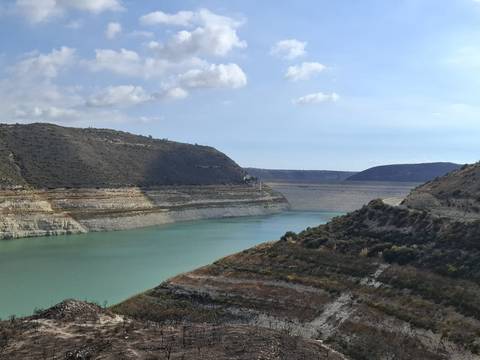 Scenic view of a canyon with water.