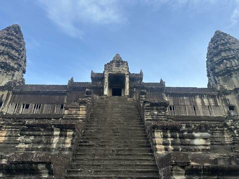 Imposing ancient temple with stairs leading up to the entrance