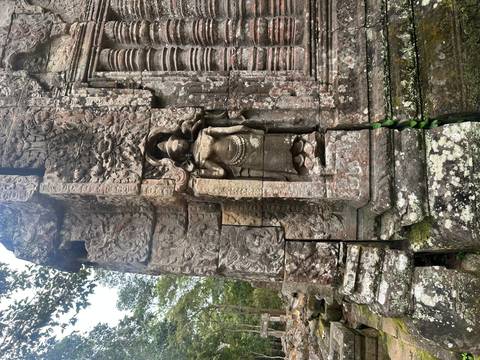 Weathered stone carvings on an ancient structure