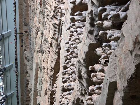 Terracotta Army, a collection of terracotta sculptures depicting the armies of Qin Shi Huang.