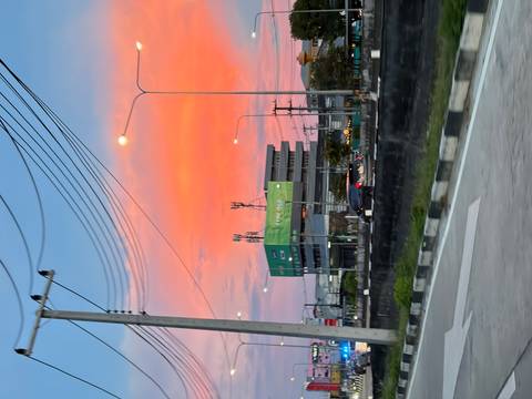 Urban buildings with a sunset sky