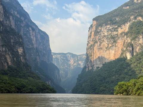 Scenic view of a canyon with steep rocky cliffs.