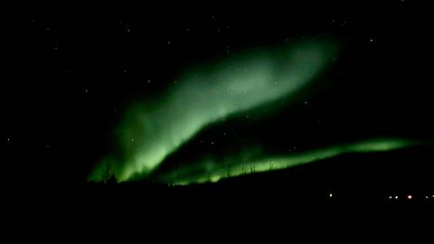 Aurora Borealis in the night sky, stunning natural phenomenon.
