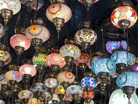 Colorful hanging mosaic lamps.