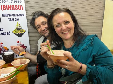 Two people enjoying a meal in a casual setting.