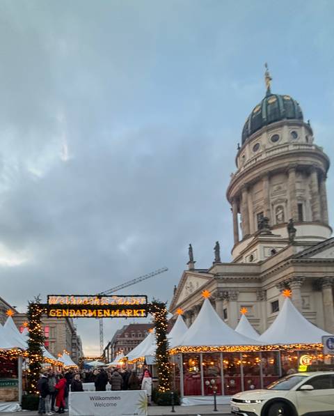 Historic architecture with cloudy sky.