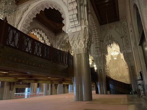 Intricate interior architecture of a mosque in Morocco.