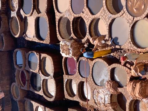 Men working in a traditional Moroccan tannery.