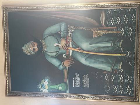 Painting of Maharana Sajjaji Singh in ornate attire.
