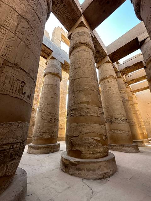 Interior view of Karnak Temple with massive hieroglyph-covered stone columns