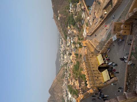 Aerial view over Amber Fort courtyard and Jaipur valley at dusk