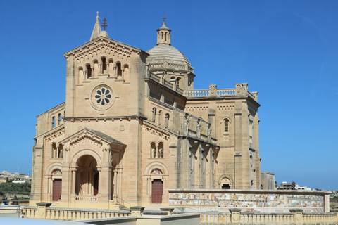 Isolated Ta' Pinu Basilica on Gozo under deep blue sky