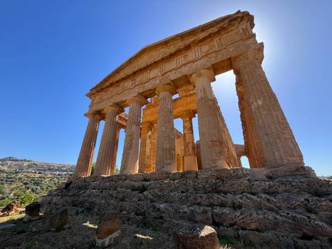 Low-angle shot of the well-preserved Temple of Concordia in Agrigento’s Valley of the Temples.