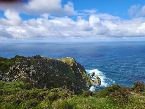 Wind-swept coastal cliffs and Atlantic ocean vistas from Ireland’s rugged northwest.