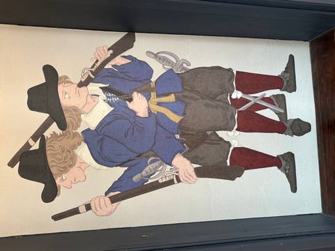 Illustrated panel showing two 17th-century soldiers standing back to back with muskets and swords.