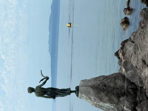 Maiden with the Seagull statue overlooking calm Adriatic waters