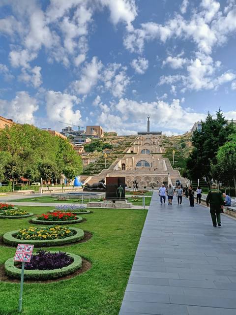 Yerevan Cascade steps and sculptures leading up a hill on a sunny day