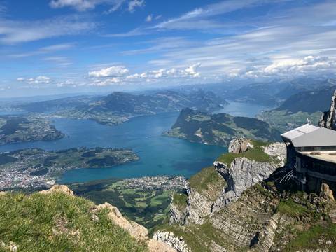 Spectacular aerial vista from Mount Pilatus showing Lake Lucerne and patchwork villages far below