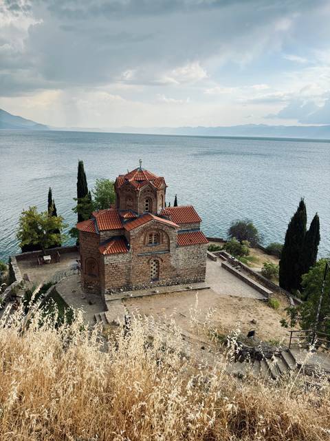 Iconic Church of St. John at Kaneo perched above the clear waters of Lake Ohrid