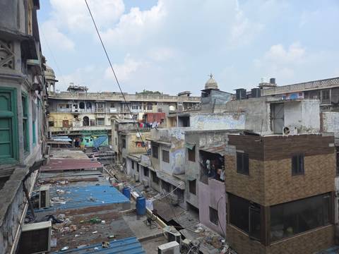 Urban view of tightly packed historic buildings and rooftops in an old Indian neighborhood