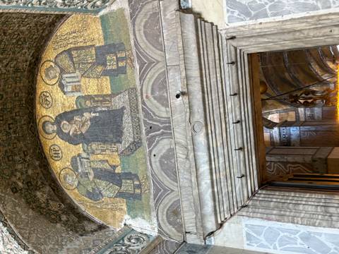 Byzantine mosaic of Virgin Mary and saints over doorway inside Hagia Sophia