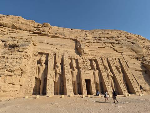 Rock-hewn façade of the Small Temple at Abu Simbel bathed in afternoon light.