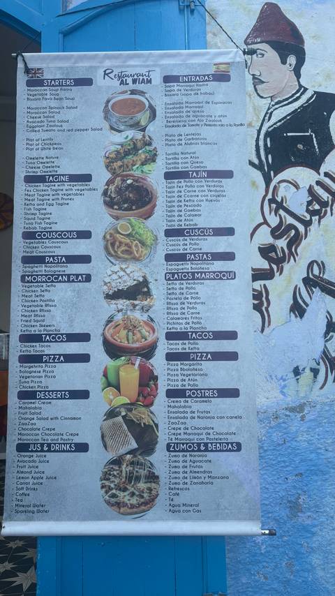 Printed restaurant menu board showing various Moroccan and international dishes.