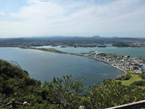 Panoramic coastal view of Jeju city and peninsulas from a high lookout