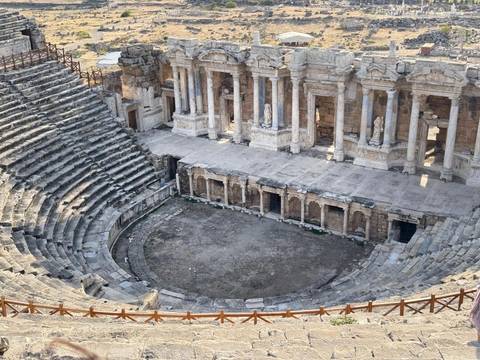 Top-down view of the stone stage and orchestra pit of the Hierapolis theater.