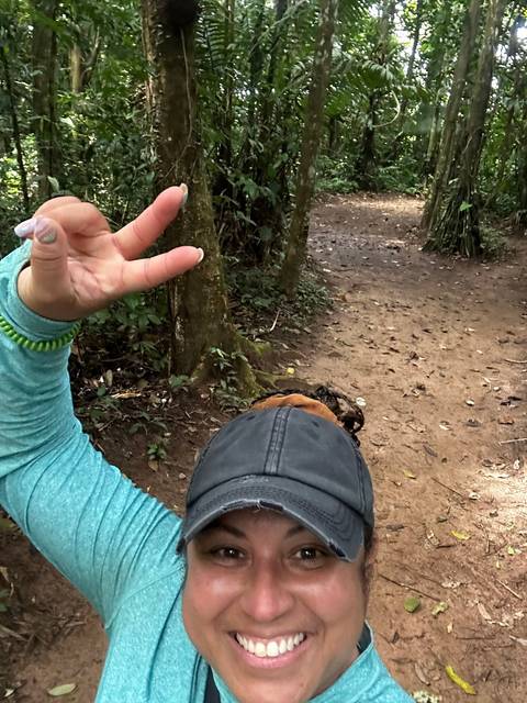 Person taking a selfie in the forest