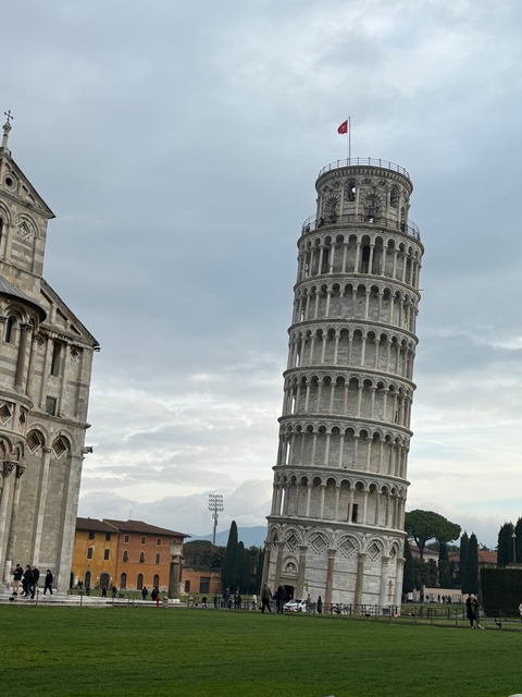 The Leaning Tower of Pisa with adjacent cathedral.
