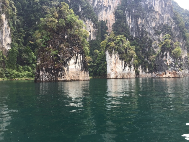 Scenic view of limestone formations and water.