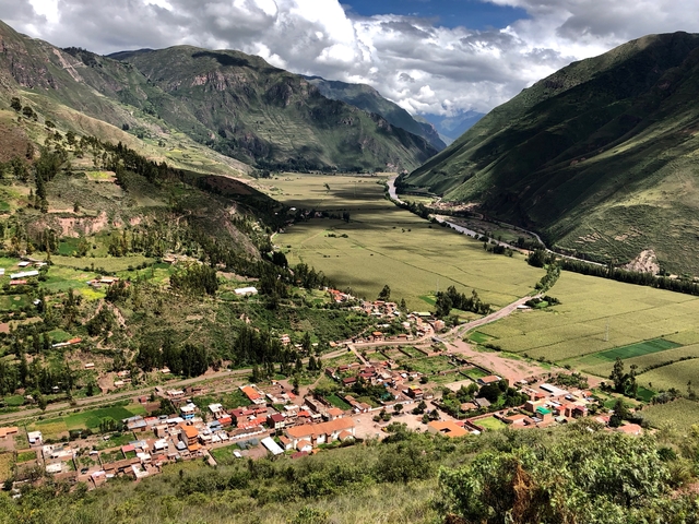 Breathtaking valley with river and mountains viewed from above.