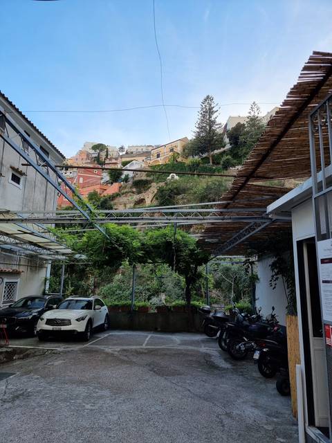 Hillside village with colorful houses.