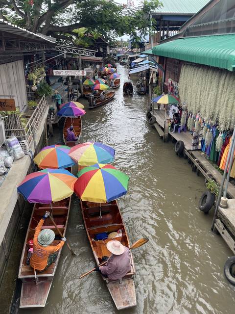 Colorful market boats on a canal.