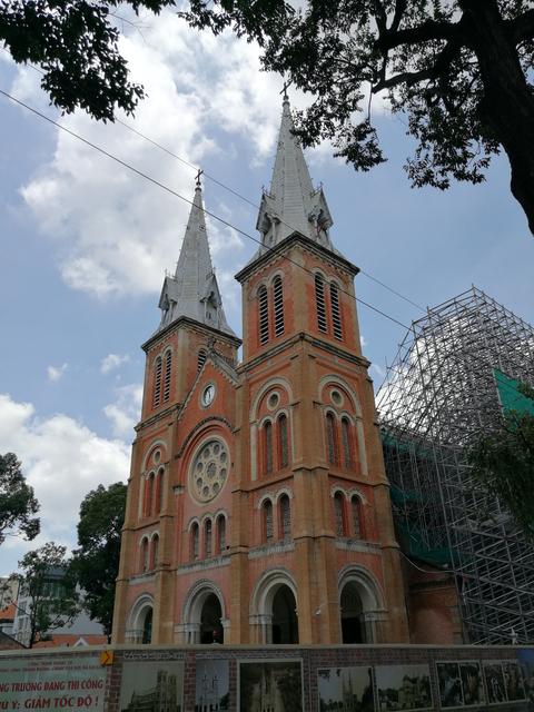 Exterior view of a historic cathedral with twin spires.