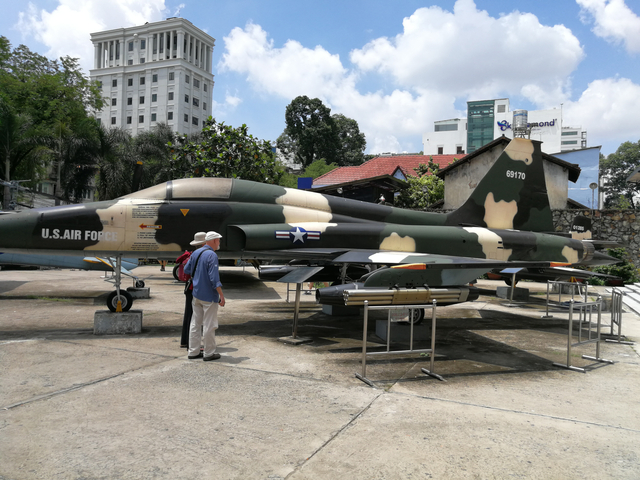 Vintage U.S. aircraft on display in an outdoor museum.