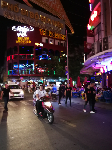 Blurred photo of a vibrant nightlife scene.