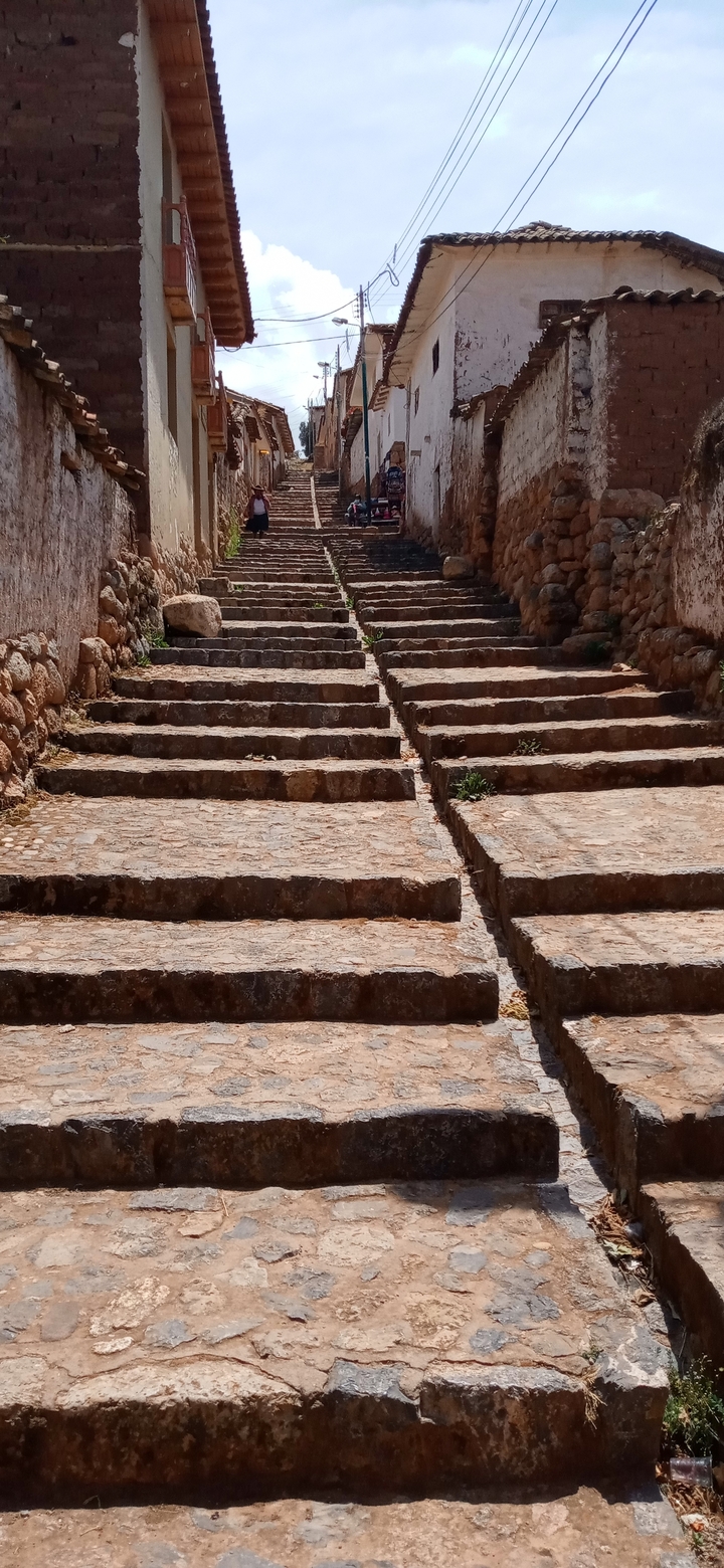 Stone steps leading upwards with perspective.