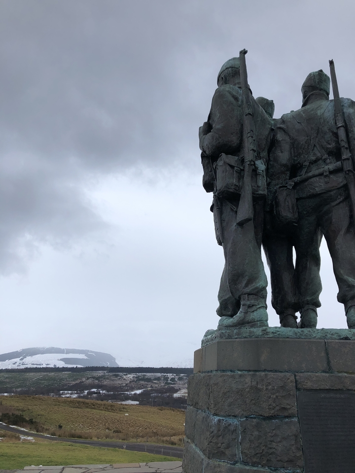 Statue against cloudy sky.