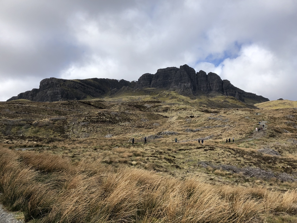 A wide landscape view of a mountain range.