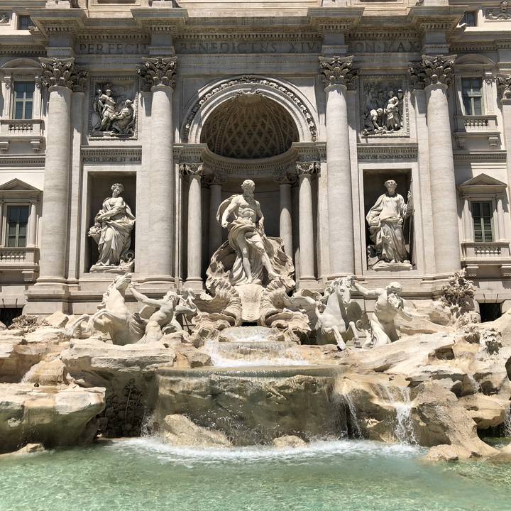 Statues and a fountain at the Trevi Fountain.
