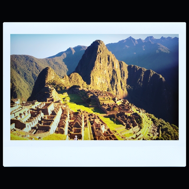Machu Picchu ruins with a stunning mountain backdrop.