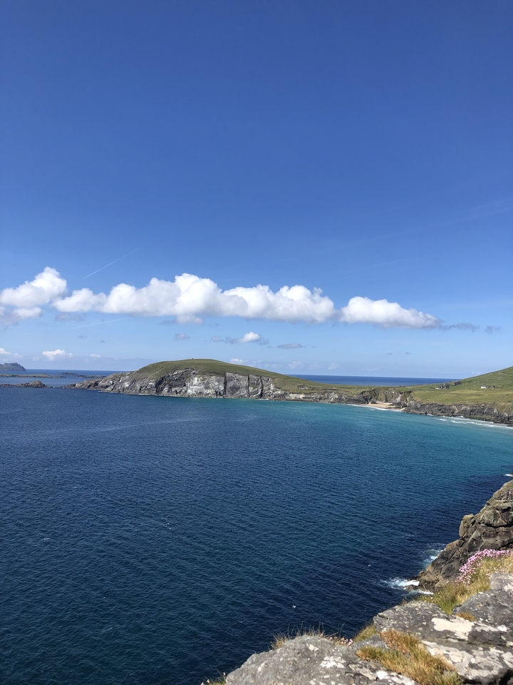Coastal view with rugged cliffs and ocean.